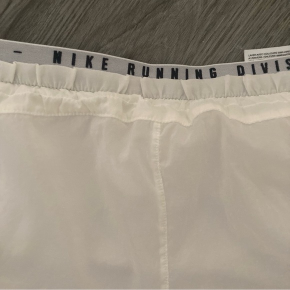 Nike White Athletic Shorts with Elastic Waistband and Curved Hem - Picture 6 of 11